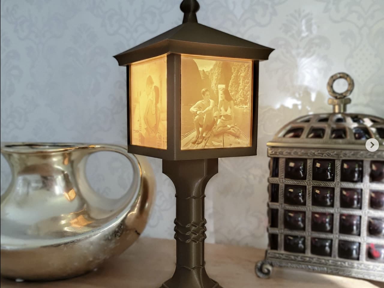 A vintage-style standing lamp on a table.